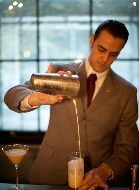 A fantastically flamboyant bartender, serving the best cocktails...